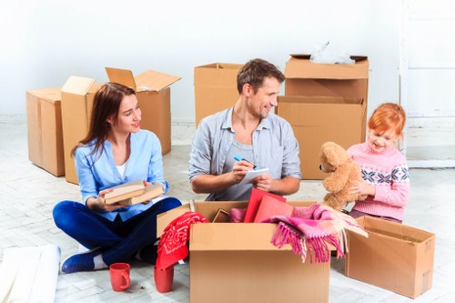 Packing and loading furniture for a home removal in Isleworth