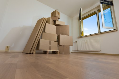Careful furniture handling during a home removal in Isleworth