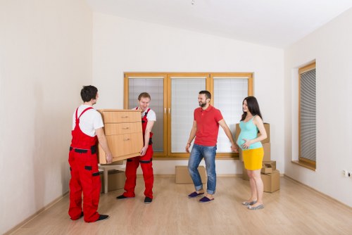 Man and van loading furniture in Isleworth