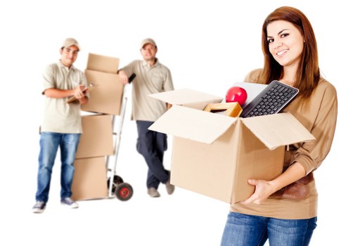 Organised moving boxes and furniture in a local house removal
