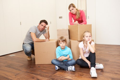 Local moving team helping with boxes and furniture in Isleworth