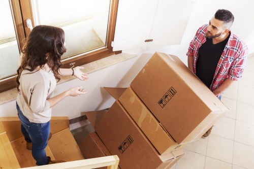 Packed boxes and furniture ready for transport during an Isleworth move