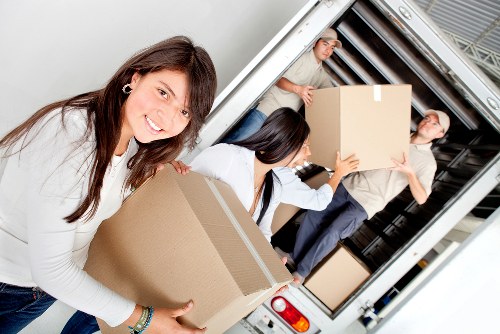 Careful furniture handling in a residential removal across Isleworth