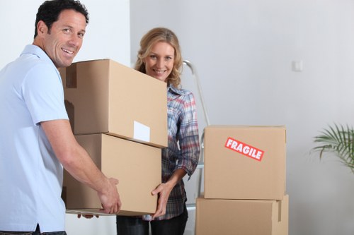 Careful loading of packed household items during an Isleworth relocation