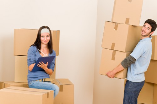 Packed moving boxes and furniture for a local relocation