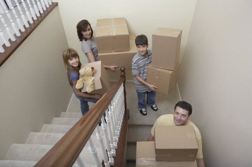 Office removal service with desks and equipment being moved